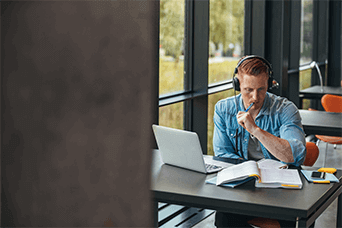 A man studying in class